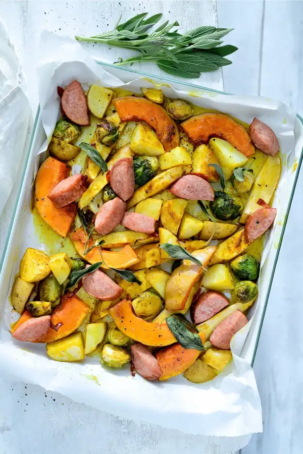 One-sheet dinner with pumpkin, Brussels sprouts, and smoked sausage