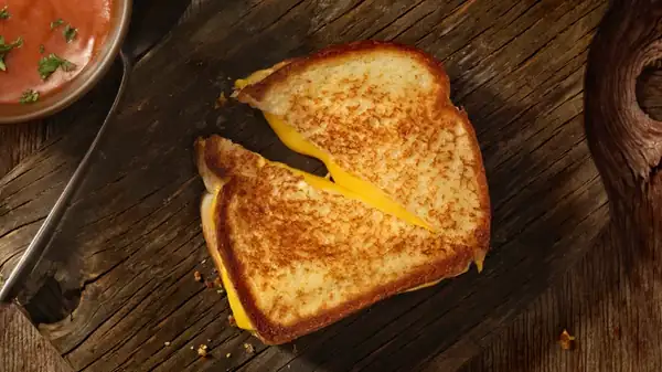 Here's How To Turn Leftover Buffalo Chicken Dip Into A Legendary Grilled Cheese Sandwich