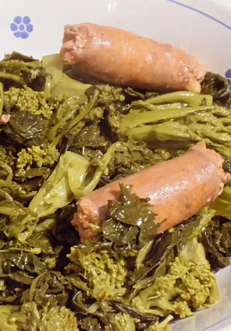 Stewed turnip tops and sausage