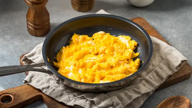 Give your scrambled eggs a Greek twist with a spoonful of this savory ingredient