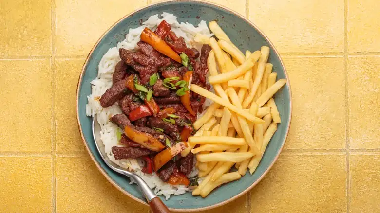 Fries Are A Key Ingredient In This Peruvian Fusion Stir Fry