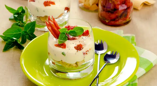 Tiramisu appetizers with sun-dried tomatoes and cheese