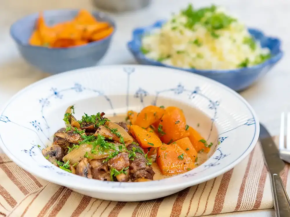 Porter-braised roulades with butter-cooked carrots