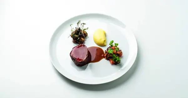 Beef tenderloin and Brussels sprouts seasoned with lemon miso