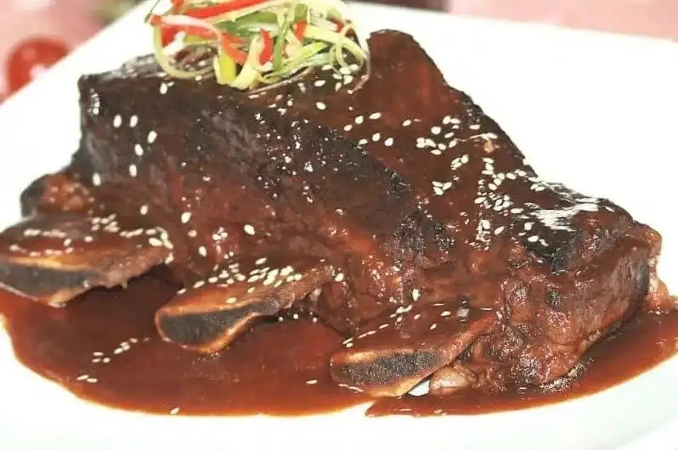 Braised Beef Short Ribs in Spiced Orange Tamarind Sauce