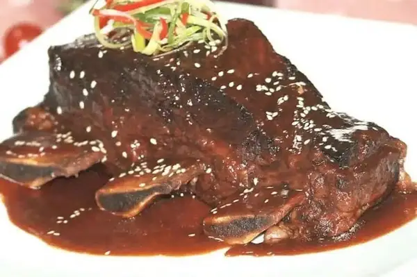 Braised Beef Short Ribs in Spiced Orange Tamarind Sauce