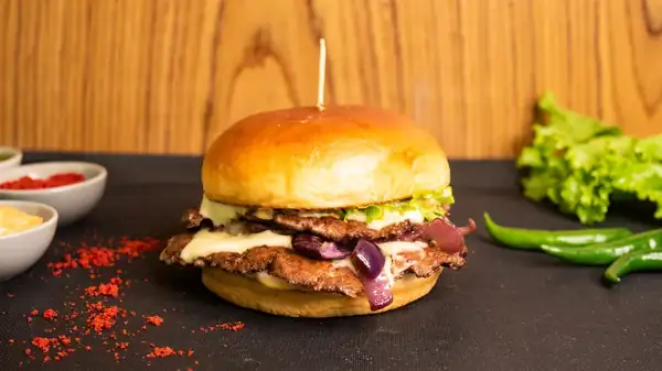 Give Your Turkey Burger A Major Flavor Boost With One Classic Technique