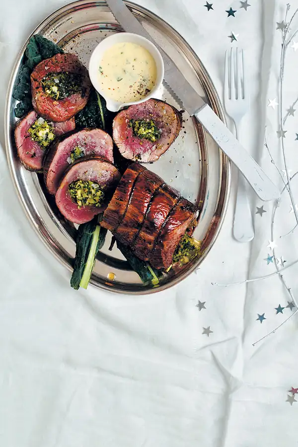 Kale, almond & feta-stuffed fillet with Parmesan and parsley cream