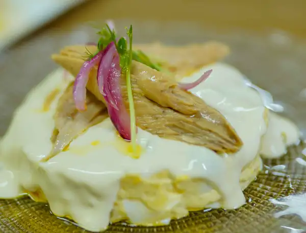 Russian salad with fried potatoes
