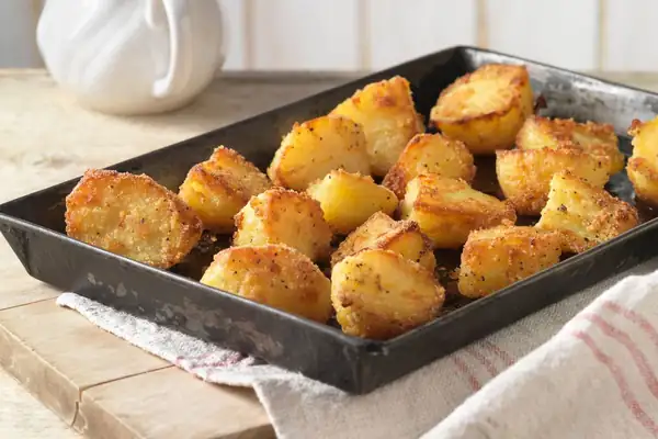 Hot honey replaces oil to crisp roast potatoes