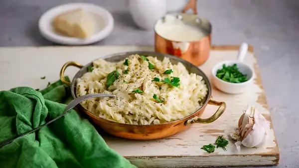 Turn Boxed Pasta Salad Into Creamy Alfredo With A Few Extra Ingredients