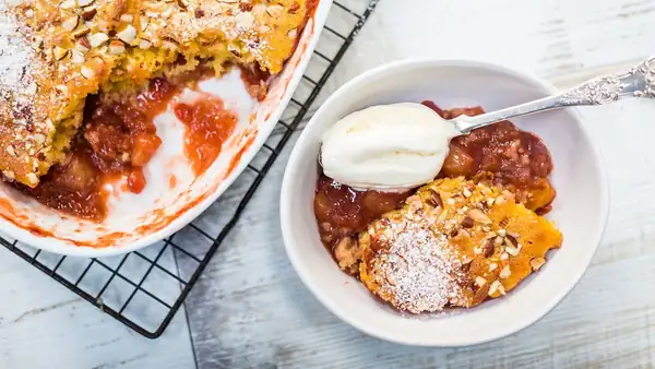 Apple and rhubarb sponge pudding recipe with berry compote