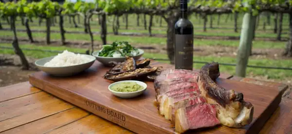 Seared wagyu tomahawk with soy sesame eggplant and chilli garlic paste