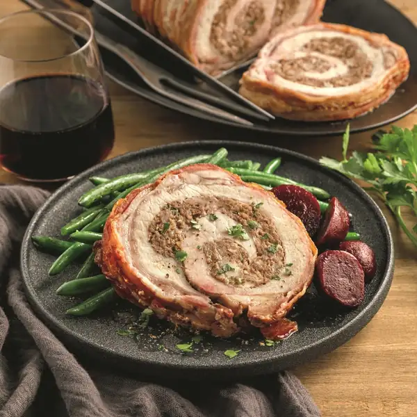 Stuffed pork roast wrapped in bacon