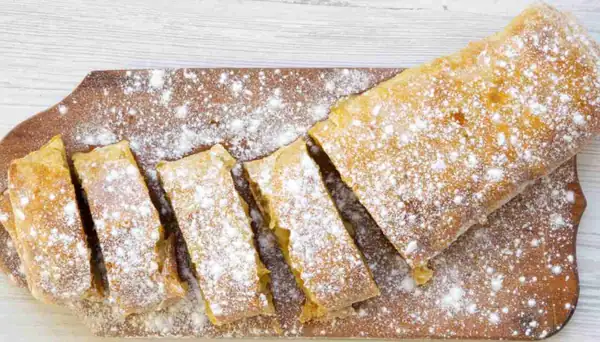 Puff pastry roll with ricotta, orange and chocolate