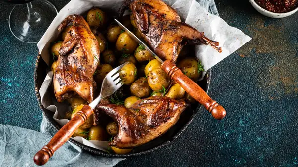 Grilled quail with potatoes