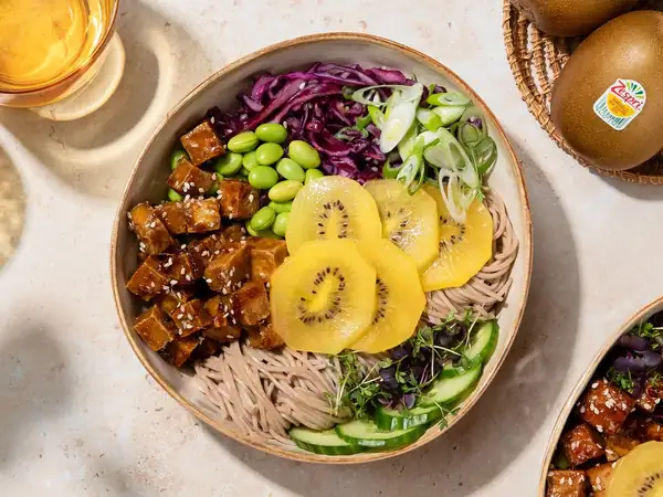 Fresh soba noodle bowl with kiwi and tofu