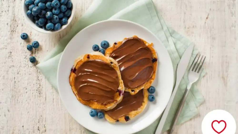 Yogurt and red berry pancakes with Nutella