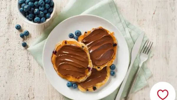Yogurt and red berry pancakes with Nutella