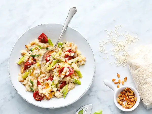 Risotto con tomates cherry secos y cebolletas