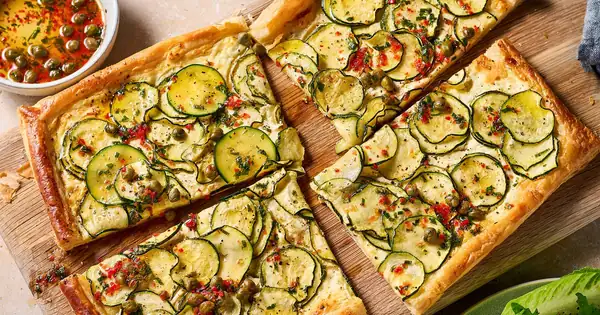 Courgette & feta tart with caper & mint dressing