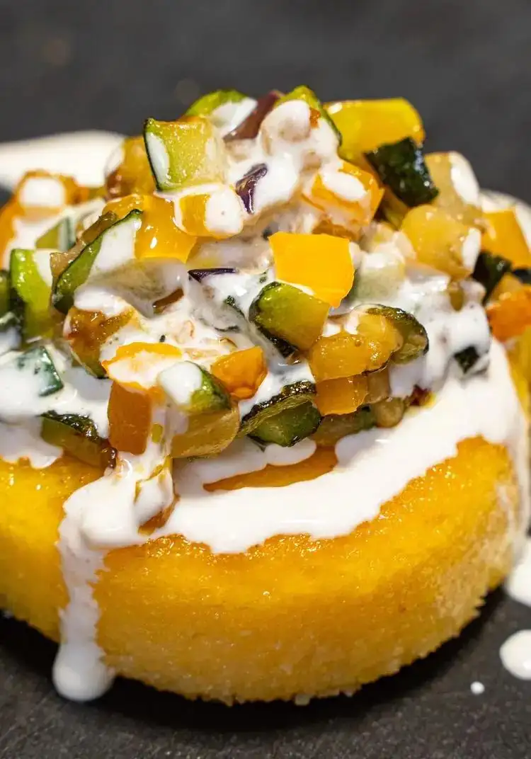 Polenta squares with Grana Padano fondue