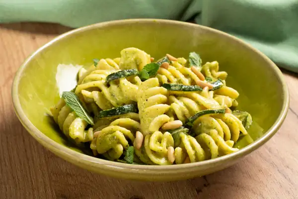 Pasta with zucchini cream and lemon-turmeric goat cheese