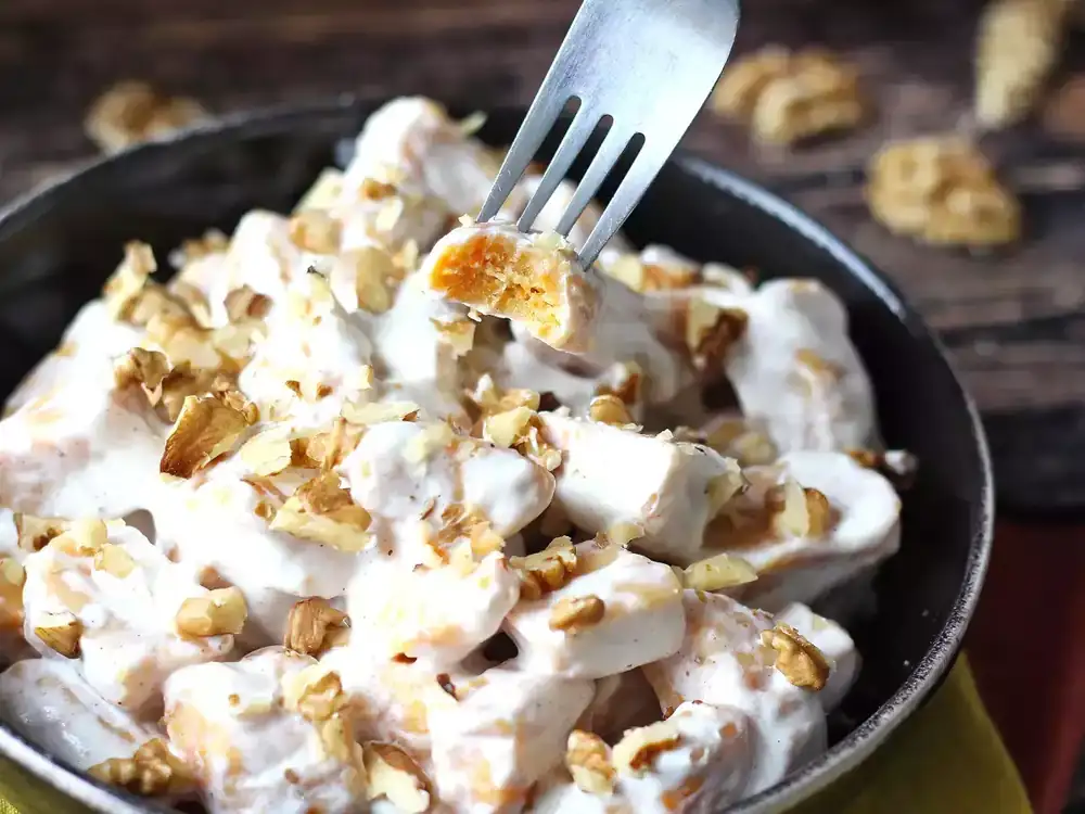 Pumpkin gnocchi with creamy Philadelphia sauce and crunchy walnuts