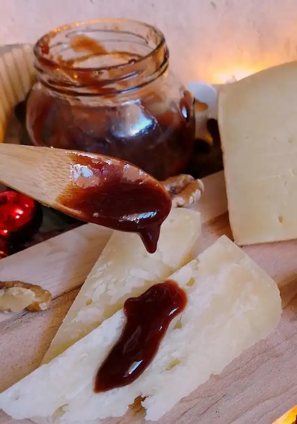 Sweet and sour sauce with plum jam, honey, spices, cocoa and balsamic vinegar