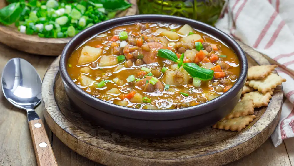Thick lentil stew with potatoes and sausage