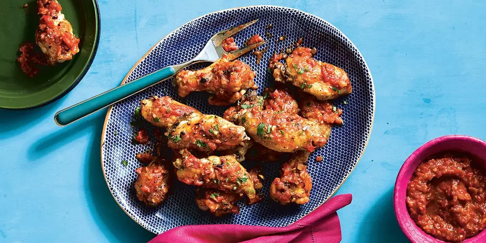 Bahian-Style Chicken Wings With Spicy Tomatoes and Coconut Sauce