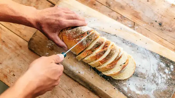 How To Cut A Loaf Of Bread Into Nice, Even Slices
