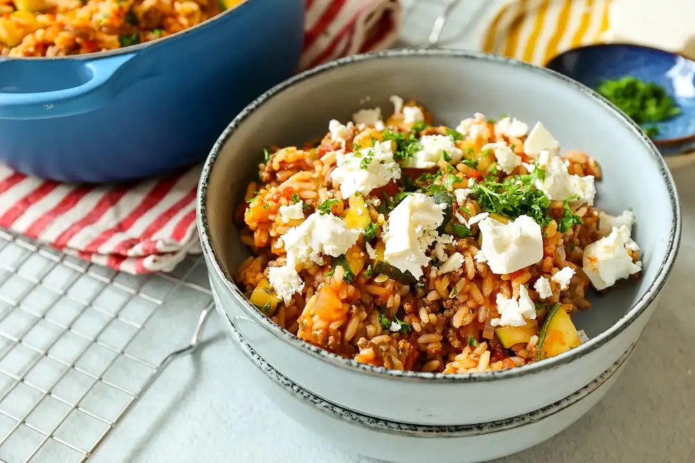 Rice dish with minced meat and feta