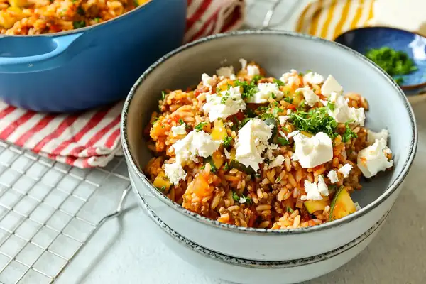 Rice dish with minced meat and feta