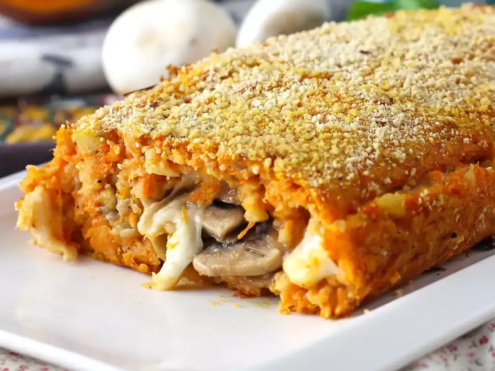 Pumpkin pie with mushrooms and cheese, juicy, melty and crispy