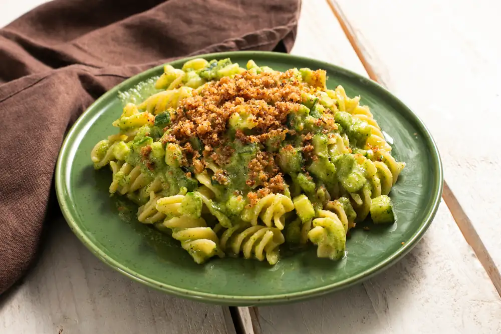 Pasta with creamy zucchini sauce, anchovies and toasted breadcrumbs