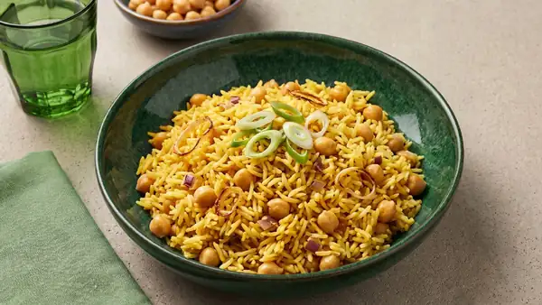 Golden-yellow coconut chickpea rice from the oven
