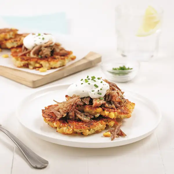 Corn cakes and Oka with pulled duck