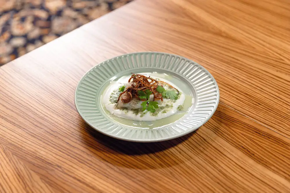 Pike perch, jalapeno yogurt sauce and crispy onion