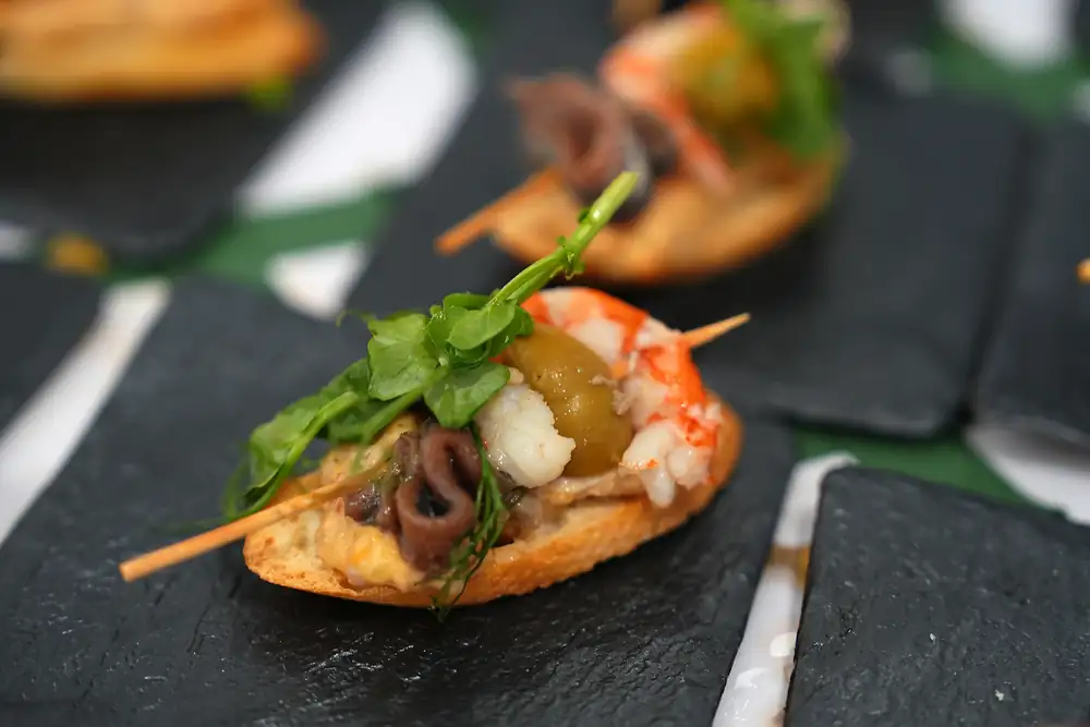 Surf and turf montadito with pickled rabbit meat