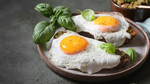 The Herbaceous Condiment You Should Be Frying Eggs In, Instead Of Oil