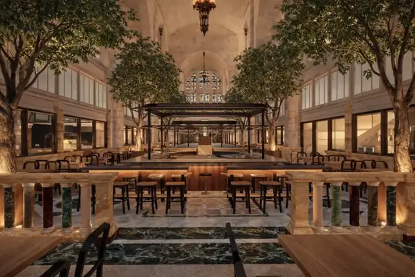 Brooklyn’s 512-foot historic Clocktower is being resurrected as a massive, world-class culinary destination—with theatrical open kitchens, aperitivo bars, & hidden dining spaces