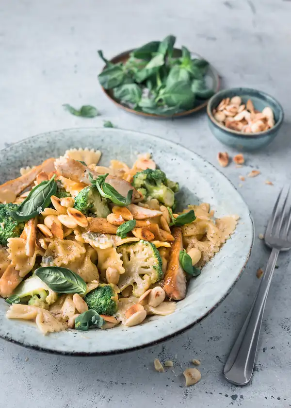 Farfalle with broccoli, chicken, and cheese sauce