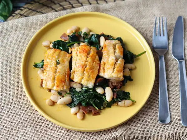 Hake with white beans, spinach and chorizo