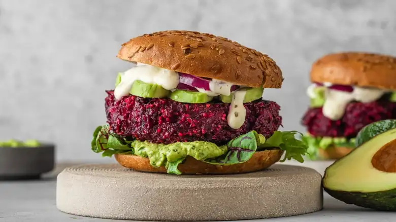 The Breakfast Ingredient Will Prevent Your Veggie Burgers From Falling Apart