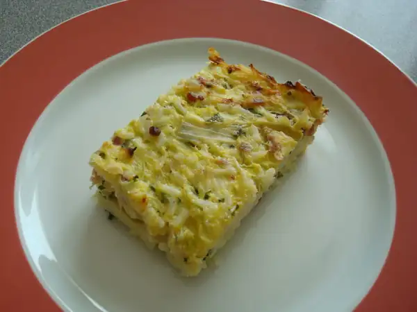 Zucchini tian with smoked bacon and Gruyère cheese