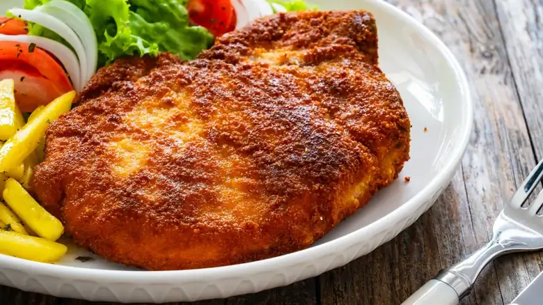 For More Flavorful Fried Pork Chops, Reach For One Crunchy Snack
