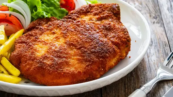 For More Flavorful Fried Pork Chops, Reach For One Crunchy Snack