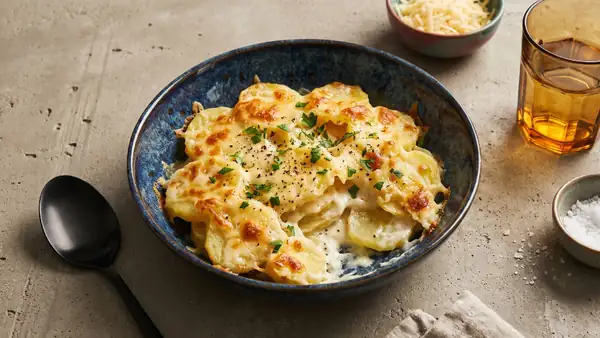 Patatas cremosas con salsa bechamel y queso