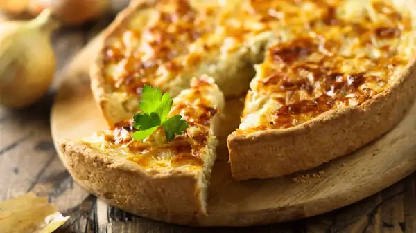Here's Why Bacon Is Such An Important Ingredient In Quiche Lorraine
